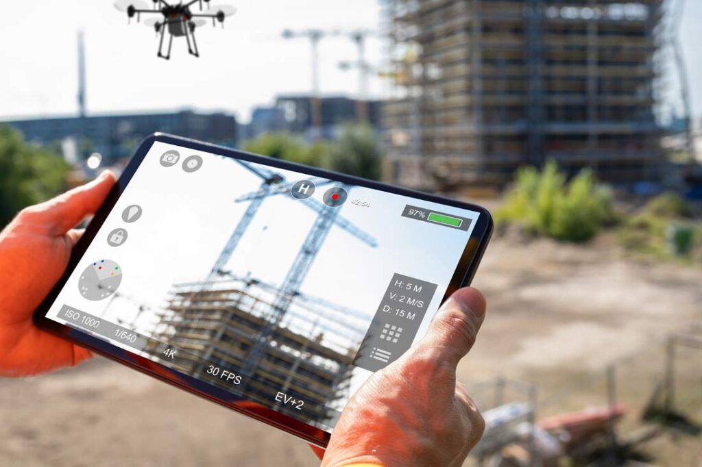 Engineer looking at video inspection on tablet