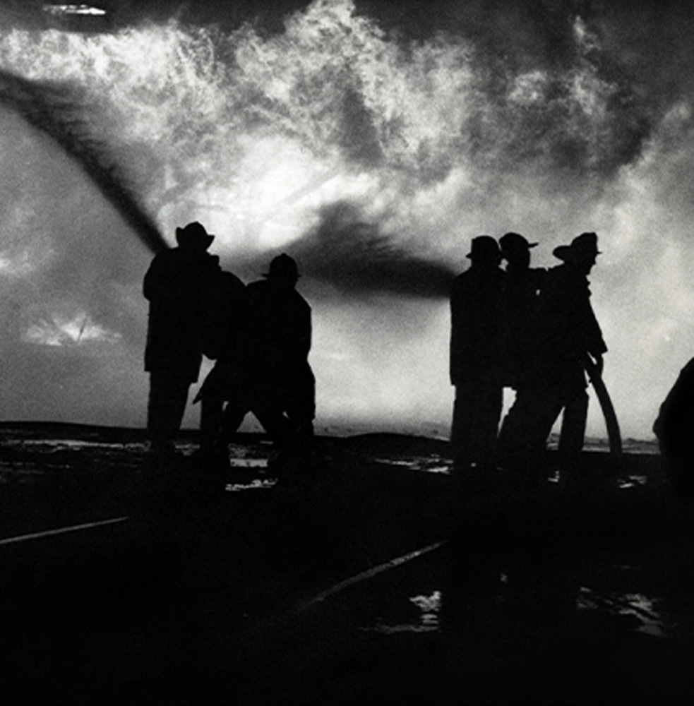 Firefighting team putting out a fire